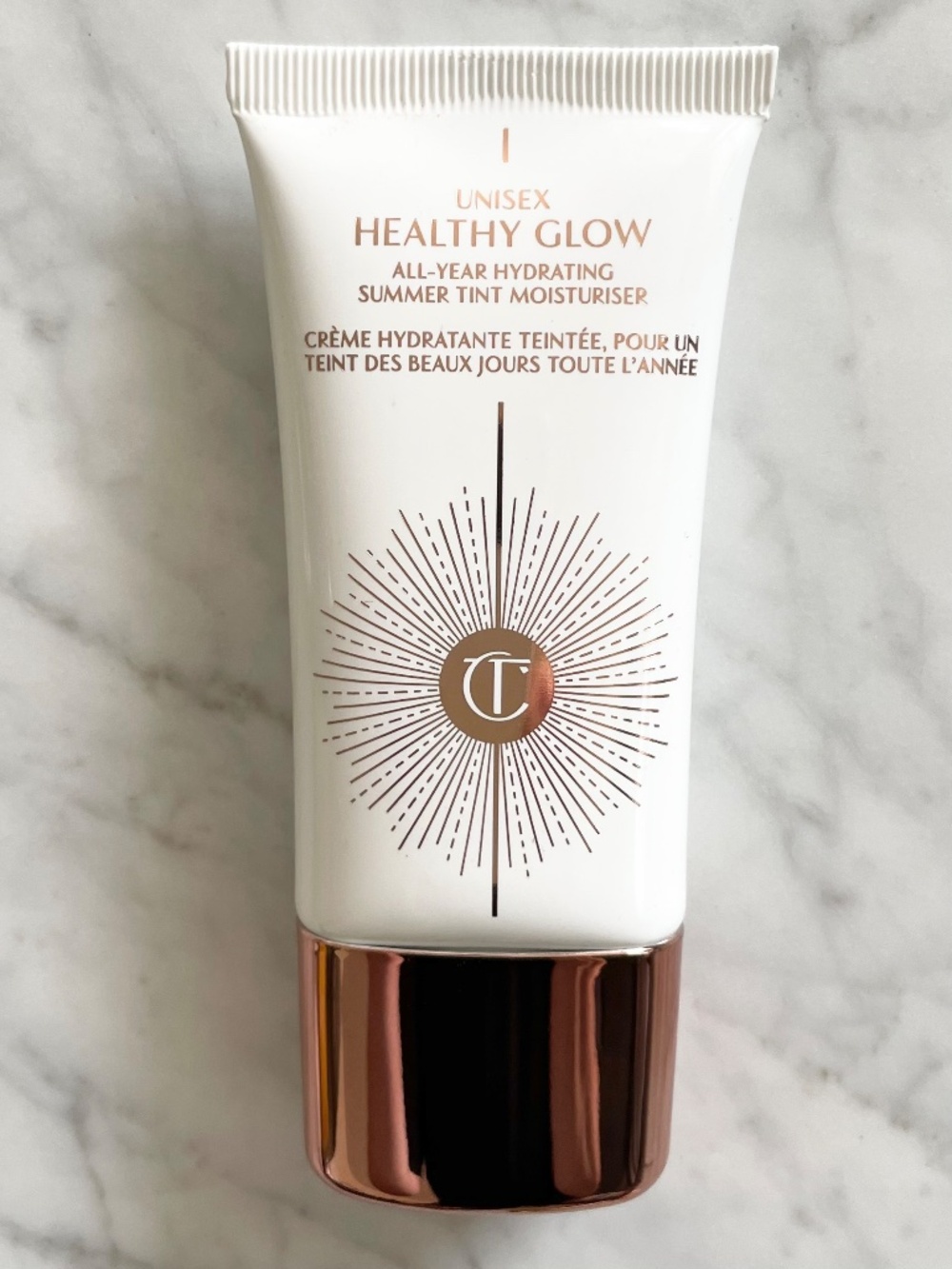 CHARLOTTE TILBURY Unisex Healthy Glow All-Year Hydrating Summer Tint Moisturiser - Picture 2 of 10